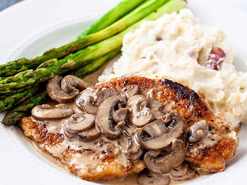 Chicken Marsala with cremini mushrooms topping