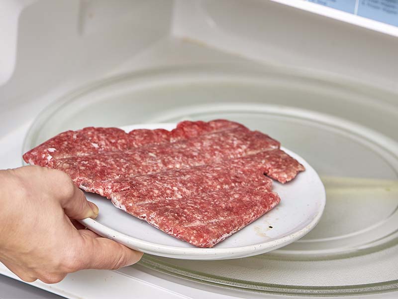 Defrost ground beef in the microwave